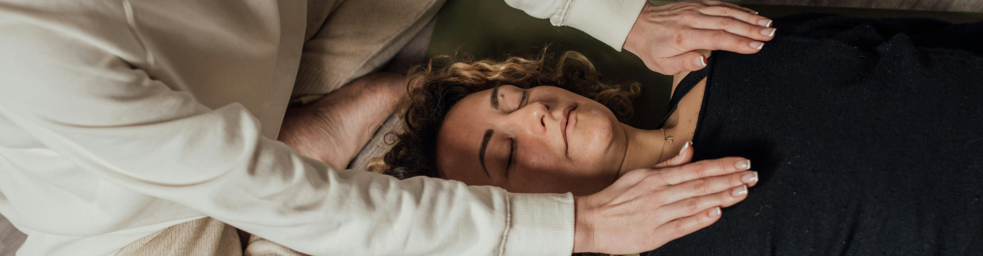 Woman in White Long Sleeve Shirt Lying on Bed